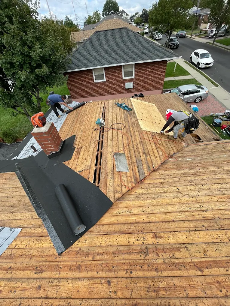 Roof decking exposed and being repaired on a Prestige roofing project