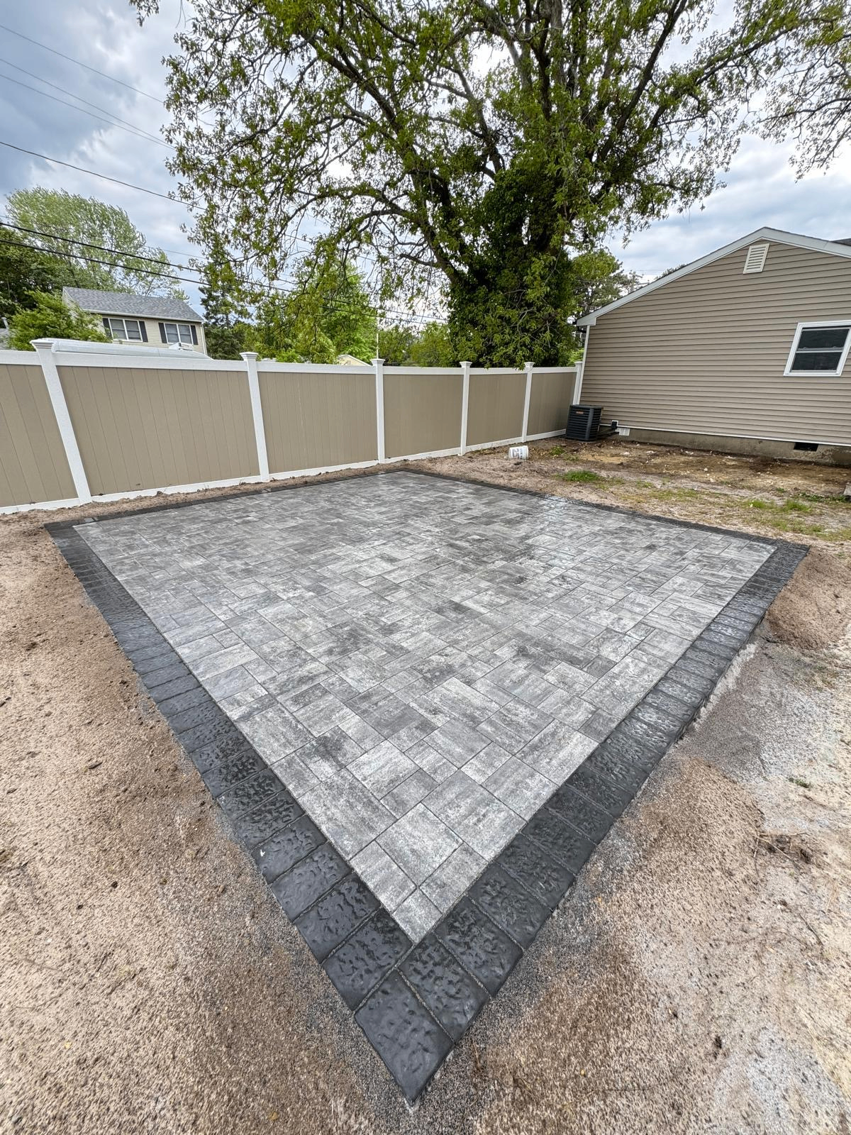 Gray Patio Pad With Charcoal Border — Prestige Home Construction, Union County, NJ